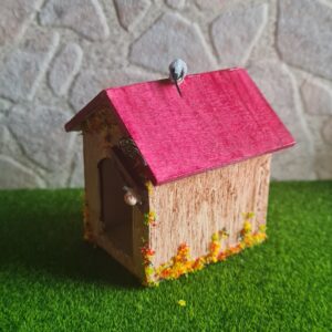 Alternative view of Dollhouse dog kennel with bird, 1/12 scale